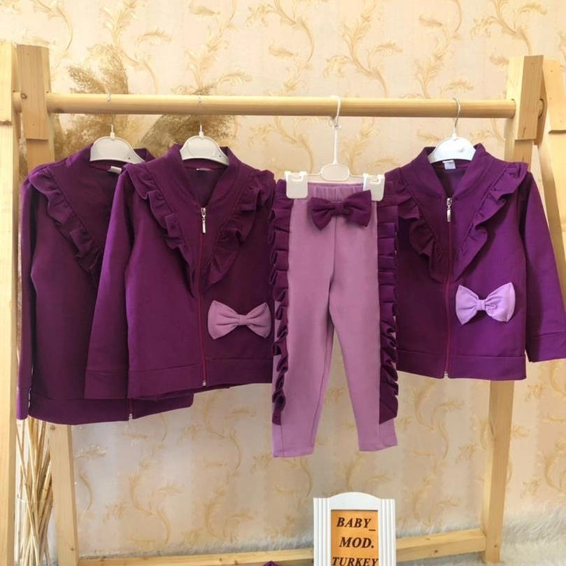 دو تیکه سویشرت شلوار بنفش پاپیون دار دخترانه ترک کد 2207 f99ee596-12a4-45b4-bf12-c949943e5fb4.jpg